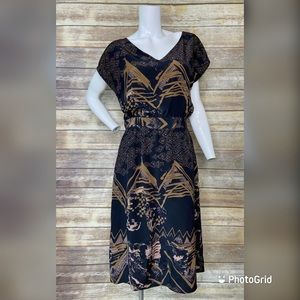 No. 6 gorgeous green and black printed silk dress size 2